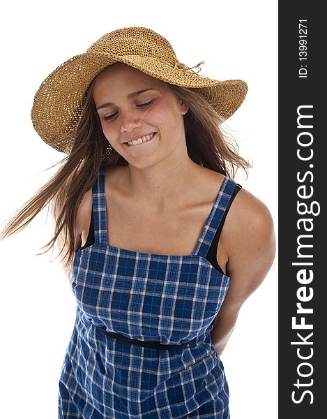 Pretty teen girl wearing an old straw hat. Pretty teen girl wearing an old straw hat