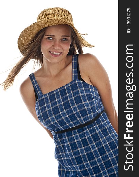 Pretty teen girl wearing an old straw hat. Pretty teen girl wearing an old straw hat