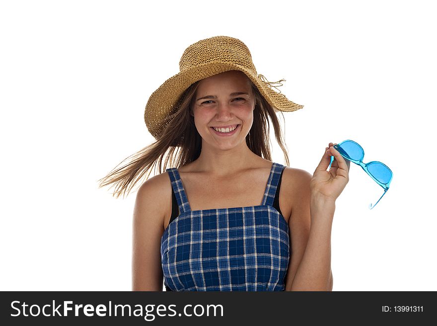 Pretty teen girl with blue sunglasses and a straw hat. Pretty teen girl with blue sunglasses and a straw hat