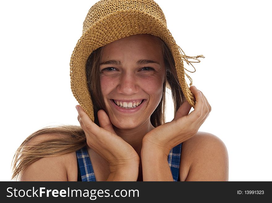 Cute teen girl in straw hat