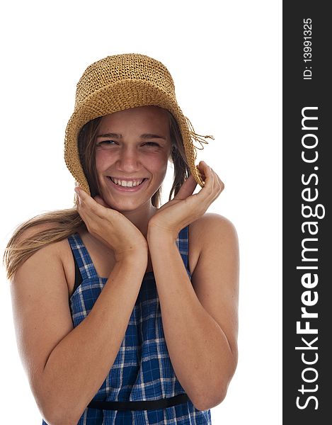 Pretty teen girl wearing an old straw hat. Pretty teen girl wearing an old straw hat