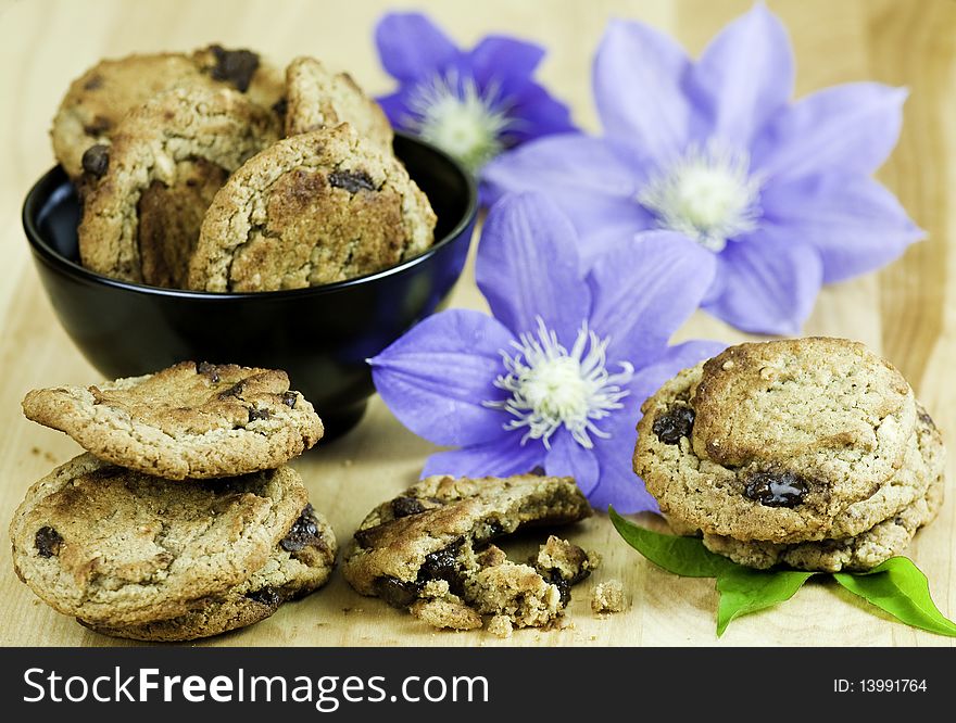 Fresh chocolate chip cookies with decorative flowers. Fresh chocolate chip cookies with decorative flowers