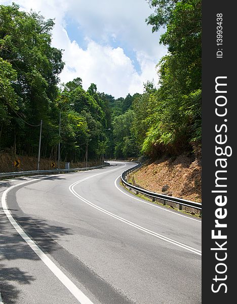 Rural scene of a s-shape curve road