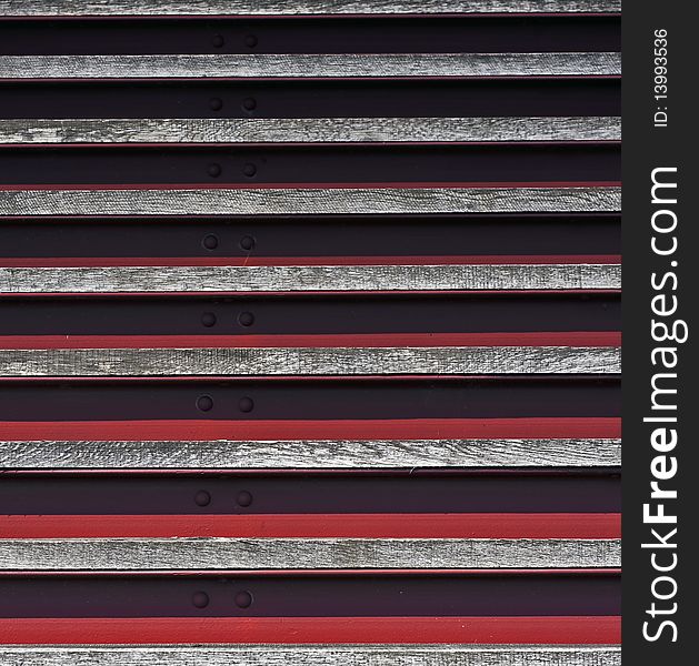 Close up of wooden Stairs and red steel. Close up of wooden Stairs and red steel