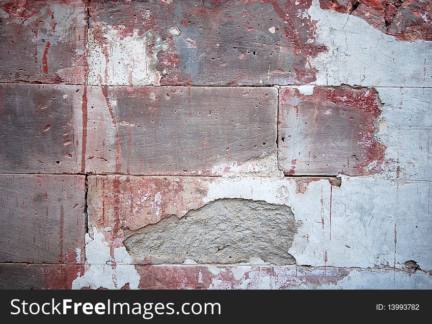 Old dirty bricks wall with cracked cement. Old dirty bricks wall with cracked cement