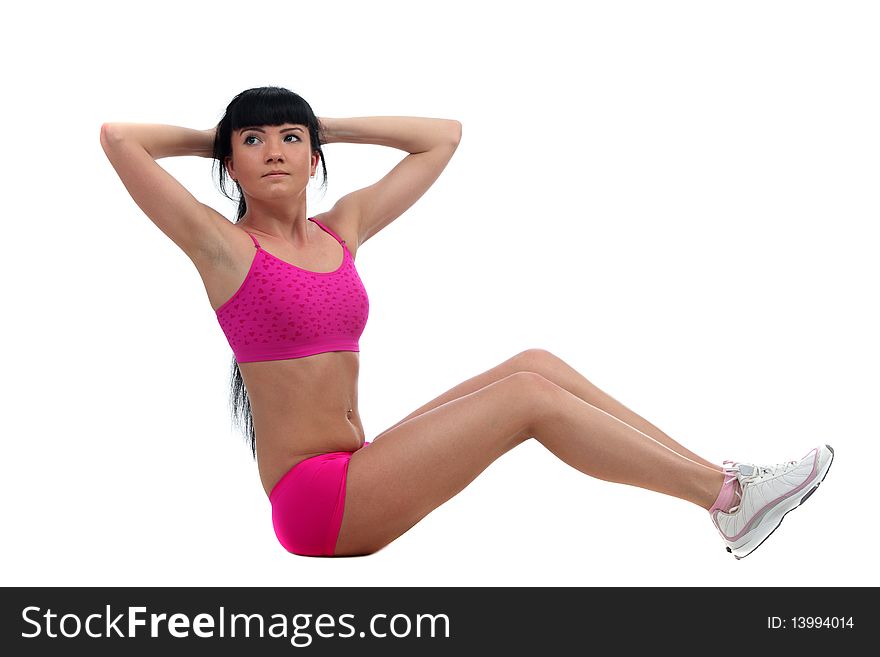 Attractive brunete girl doing gymnastic excersises