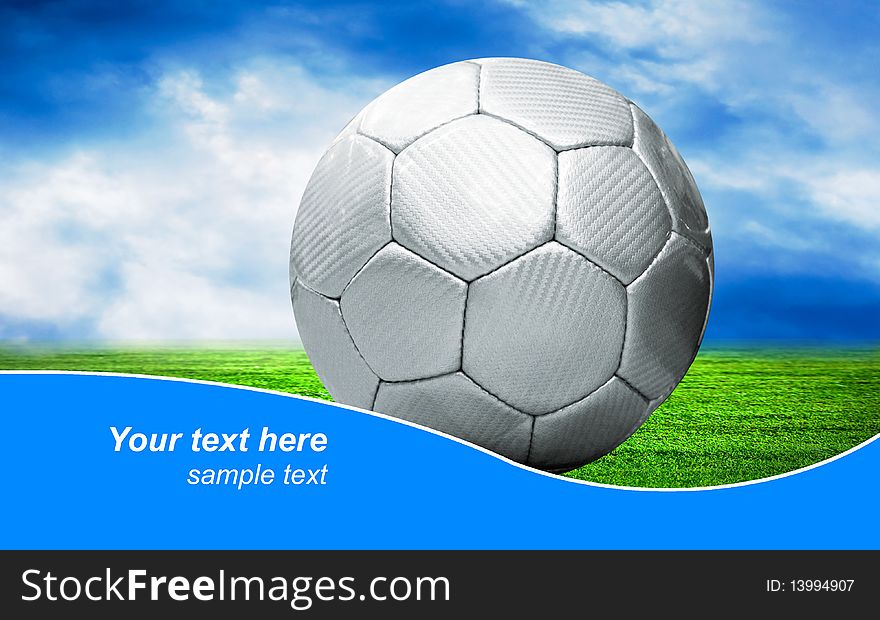 Ball on the outdoors field  with blue sky and sample text. Ball on the outdoors field  with blue sky and sample text