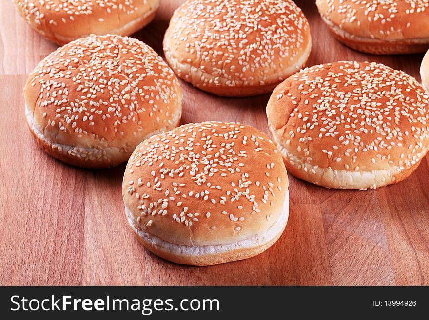 White buns with sesame seeds on top. White buns with sesame seeds on top