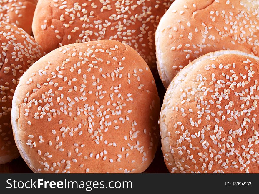 White buns with sesame seeds on top. White buns with sesame seeds on top