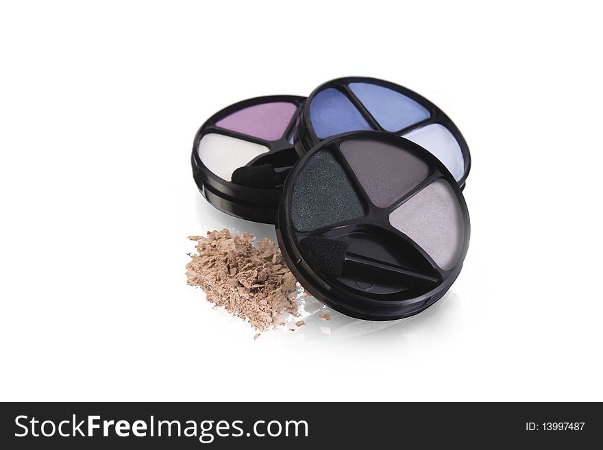 Cosmetics, Eyeshadows isolated on a white background. Cosmetics, Eyeshadows isolated on a white background.