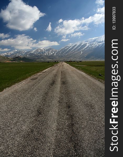 Mountain road panorama captured in Castelluccio di Norcia. Mountain road panorama captured in Castelluccio di Norcia