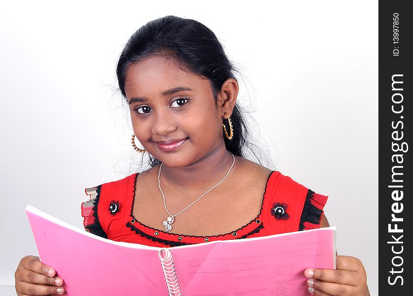 Asian young girl reading the book