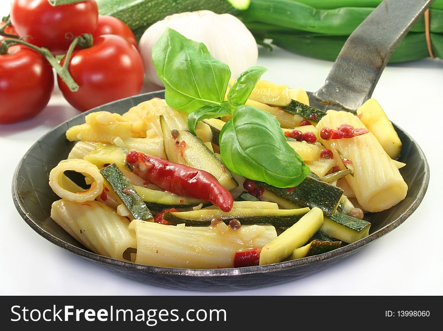 Tortiglione with fiery chili, zucchini, garlic and herbs. Tortiglione with fiery chili, zucchini, garlic and herbs