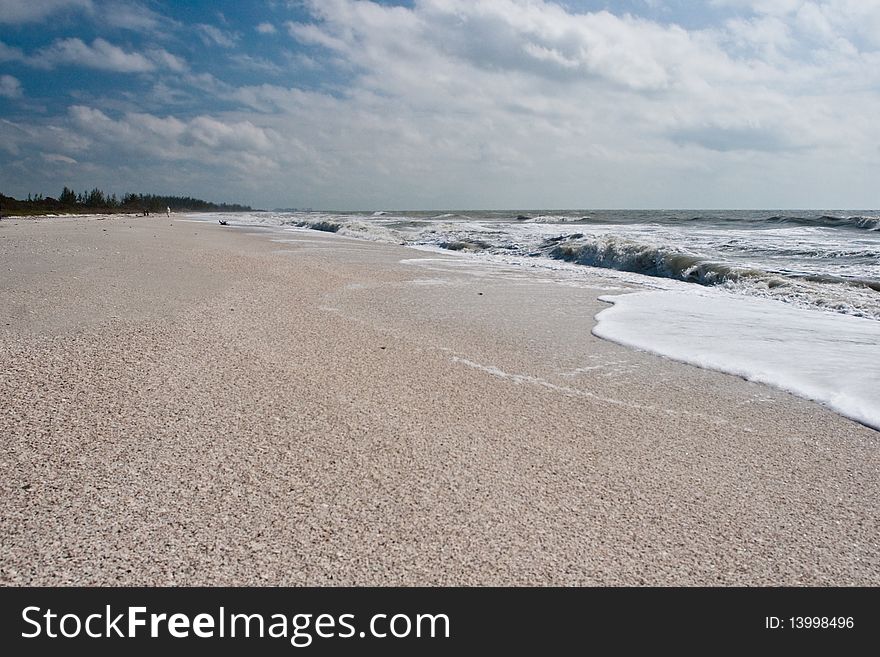 Sandy beach and waves in Florida
