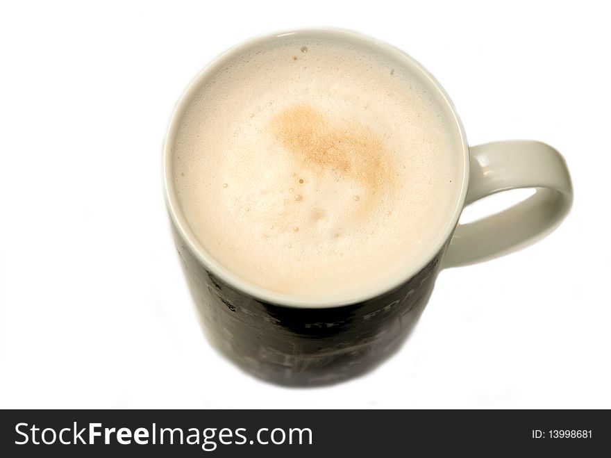 A hot cup of capuccino isolated on white