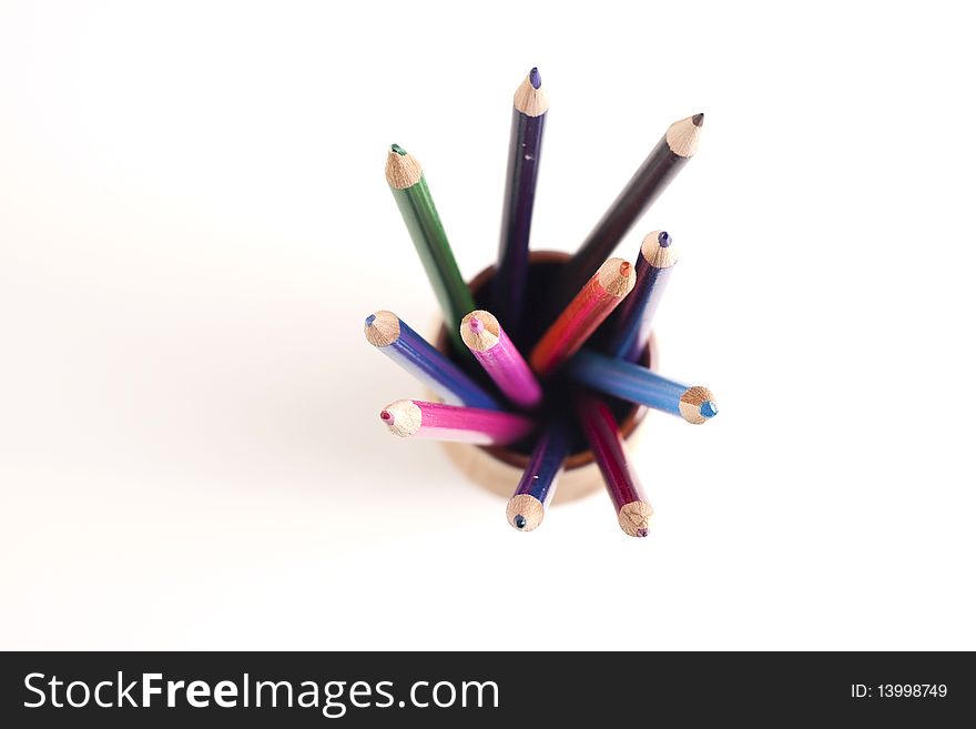 Colored pencils with eraser on white background. Colored pencils with eraser on white background