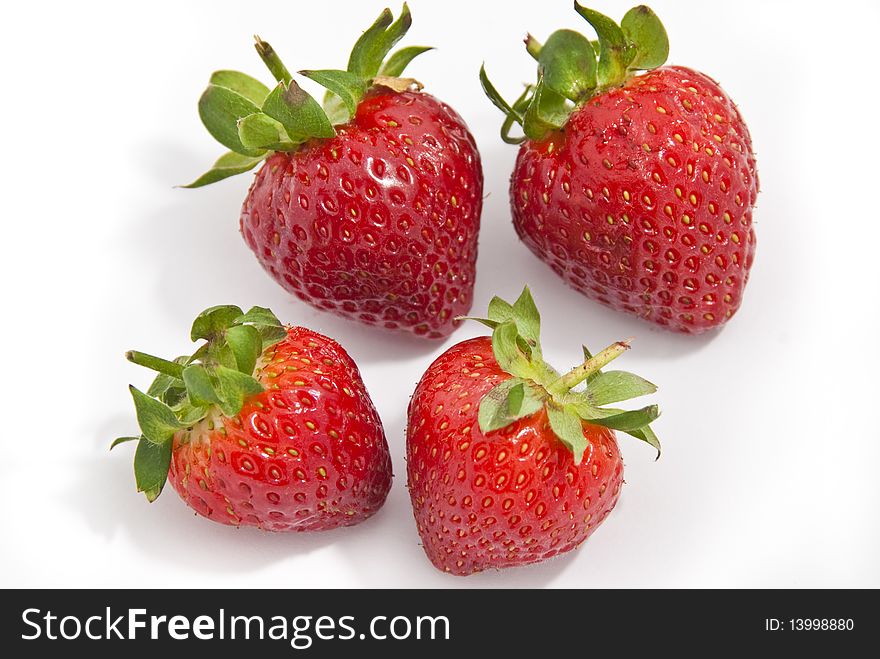 A group of isolated strawberries. A group of isolated strawberries