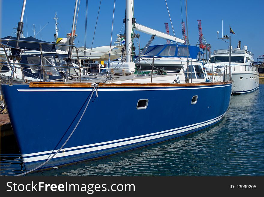 Blue modern yacht in harbour