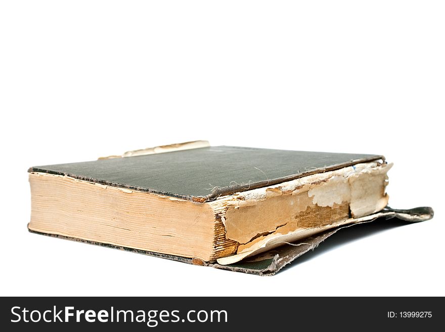 Detail of an old book isolated on white.