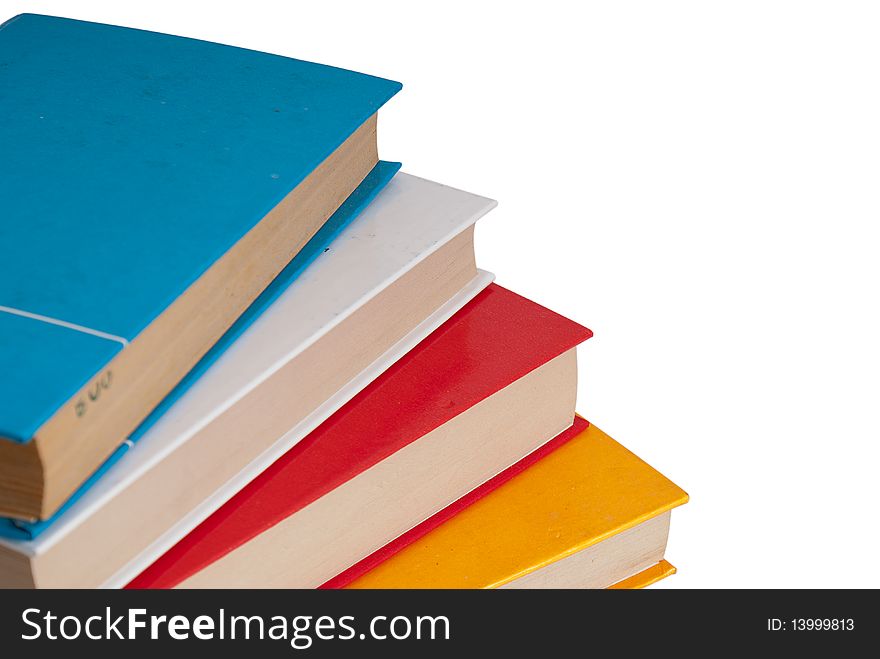 A stack of books on white background. A stack of books on white background