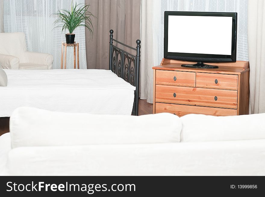 The big TV set in bedroom