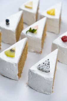 Delicious Creamy Minimal White Cake With Fruit On White Background Stock Image