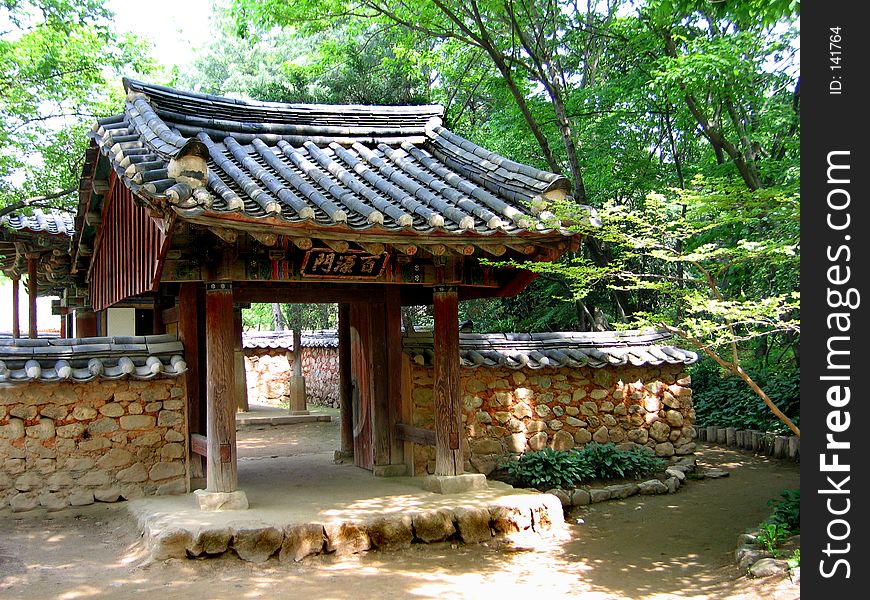 Vivid details of a typical entrance to a Korean compound. Vivid details of a typical entrance to a Korean compound