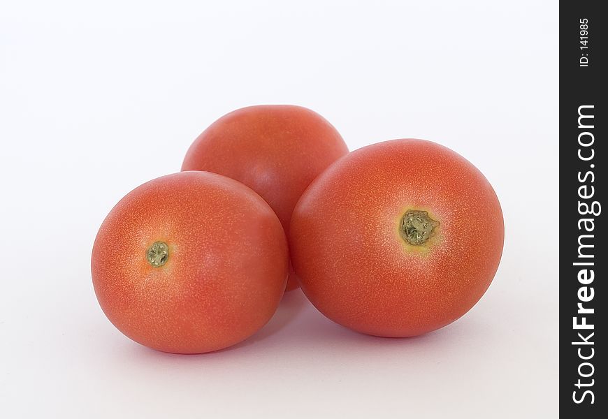 Three tomatoes close up