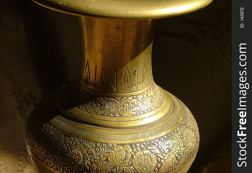 Artistic gilded vase. Artistic gilded vase