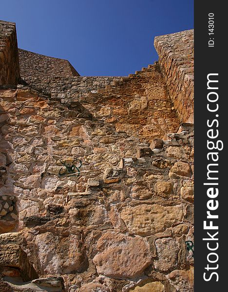 Old stone wall on the portuguese coast of the atlantic. Old stone wall on the portuguese coast of the atlantic