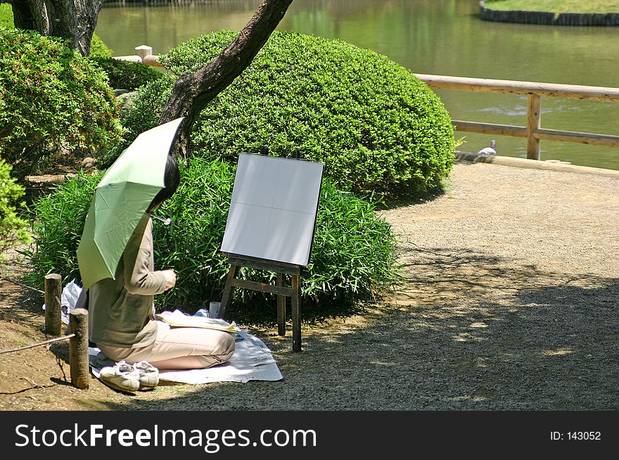 Japanese artist in Rikugien park, Tokyo, Japan