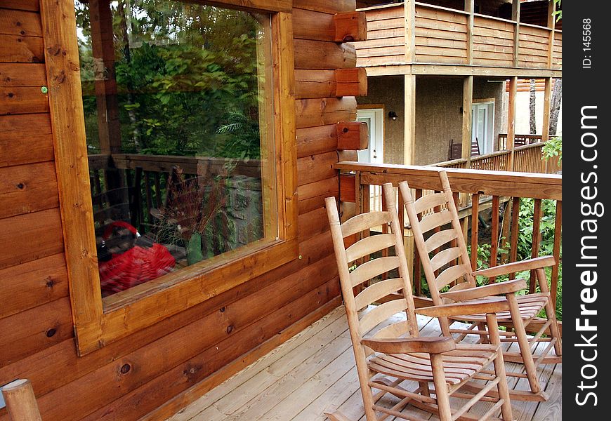 The porch of a vacation cabin.