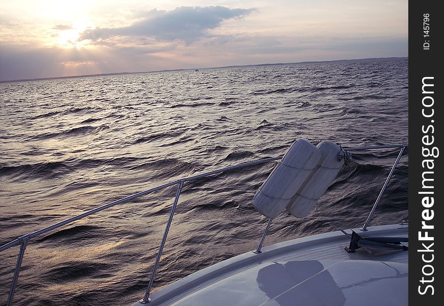 Boat view of a sunset on the bay. Boat view of a sunset on the bay