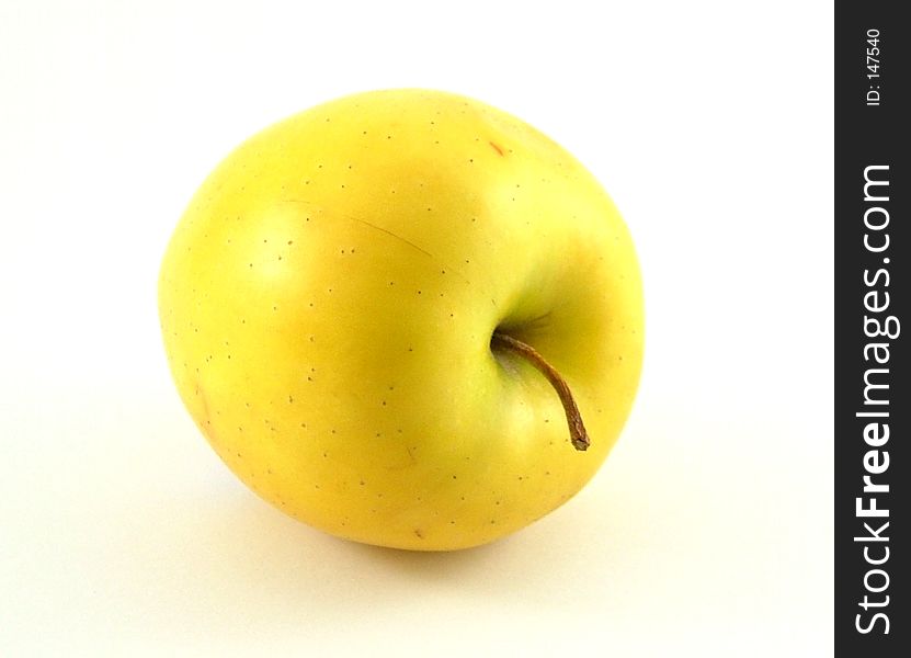 A yellow apple. A yellow apple