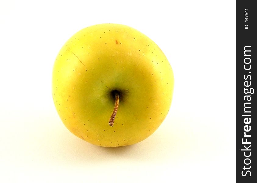A bright yellow apple