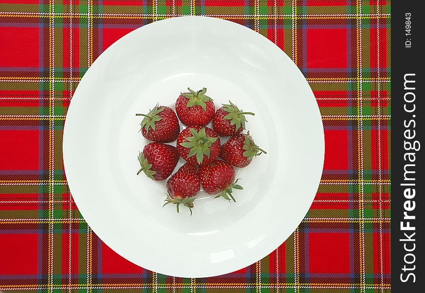White plate with strawberries. White plate with strawberries