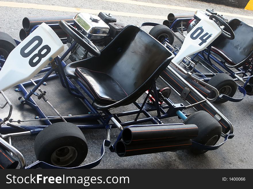 Row of go carts at a race track. Row of go carts at a race track