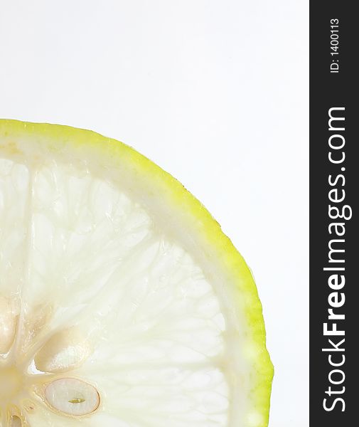 Lemon partial slice close up with back light