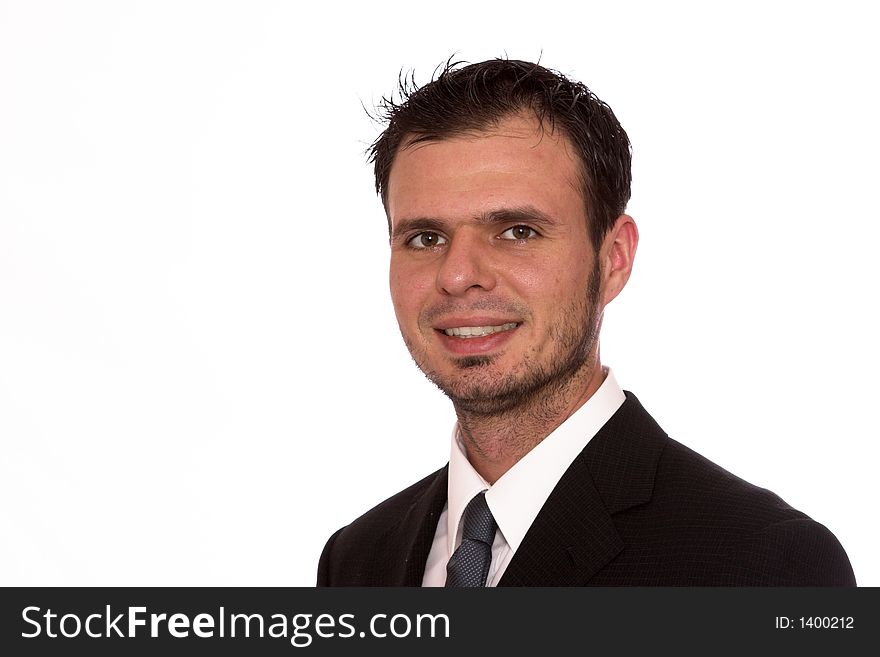 Young businessman smiling at the camera, isolated. Young businessman smiling at the camera, isolated