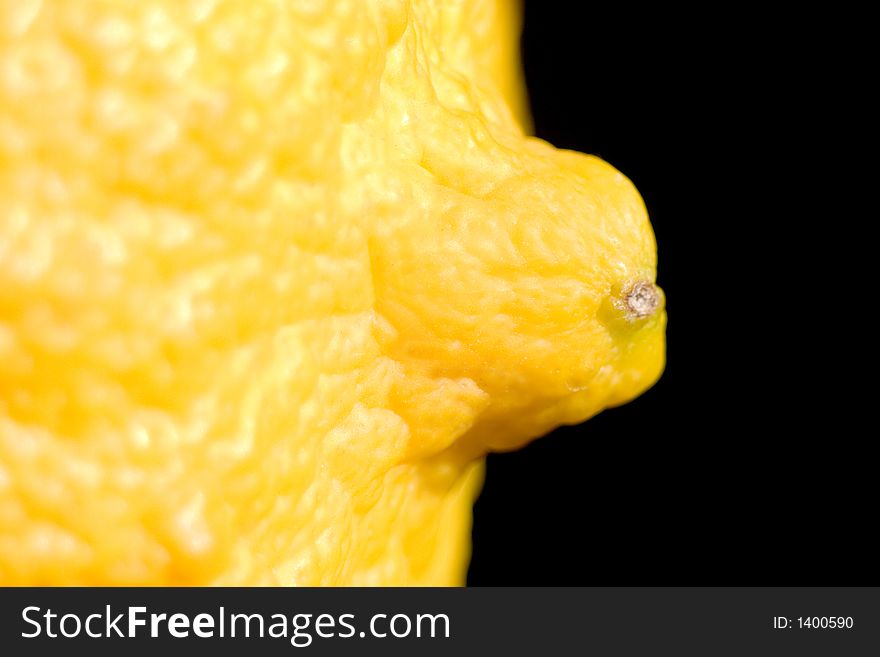 Fresh lemon close-up on black