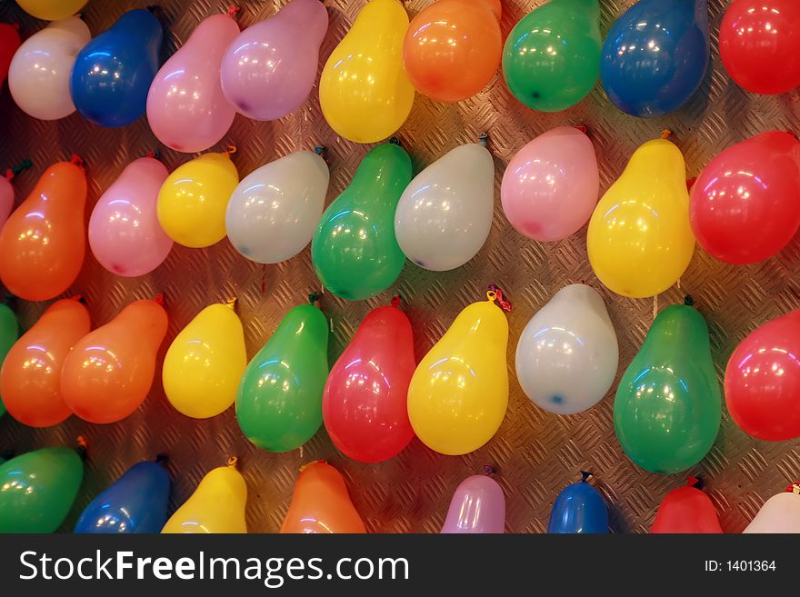 Balloons placed on a wall create joyful mood