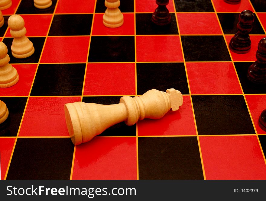 King piece on a chess board in the draw position. King piece on a chess board in the draw position.