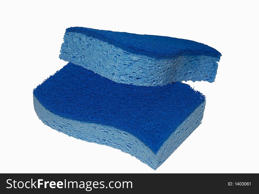 Two-tone blue sponges isolated on a white background.