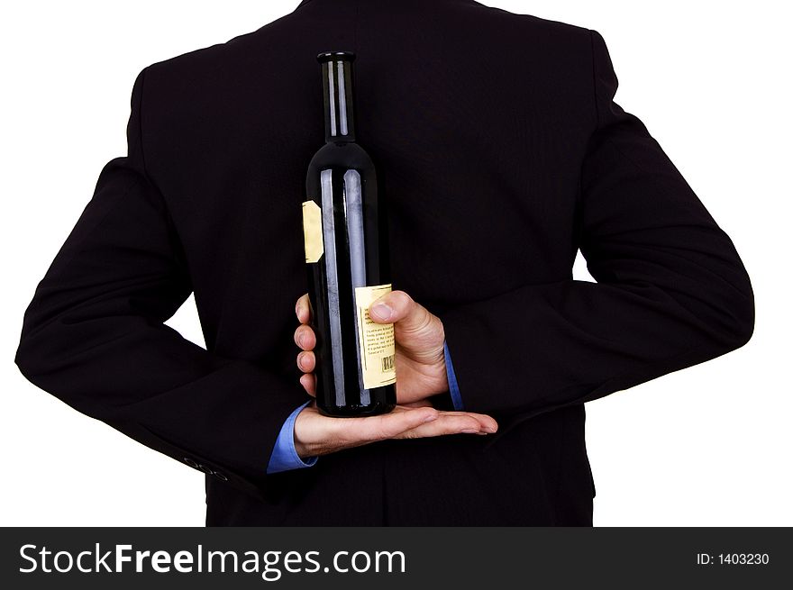 Man holding a wine bottle over white. Man holding a wine bottle over white