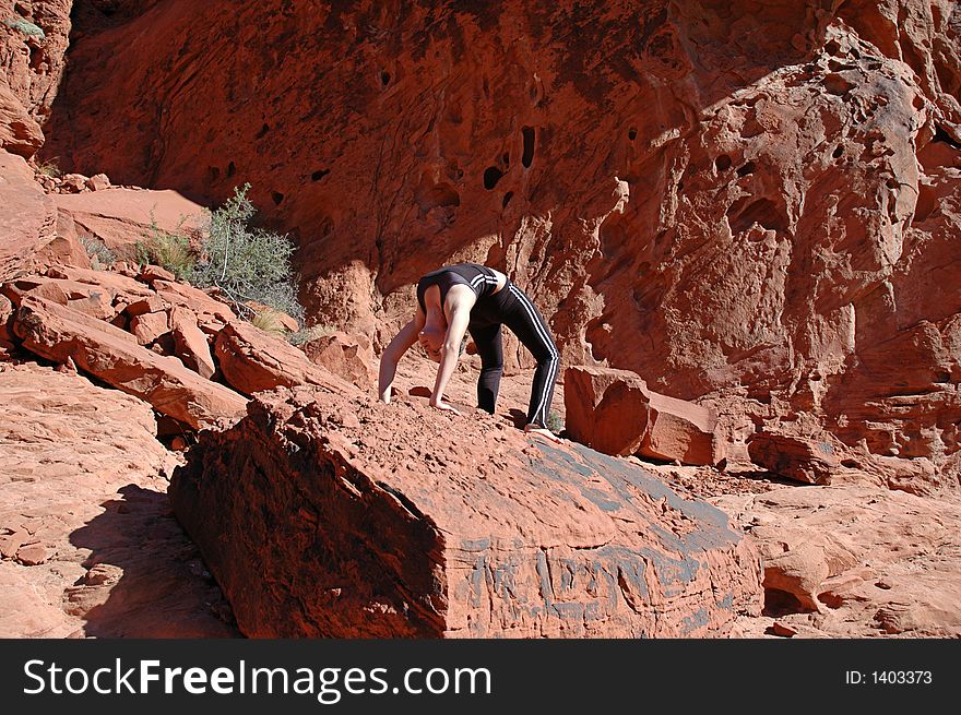A girl doing yoga in Red Rock Canyon, Las Vegas Nevada. A girl doing yoga in Red Rock Canyon, Las Vegas Nevada