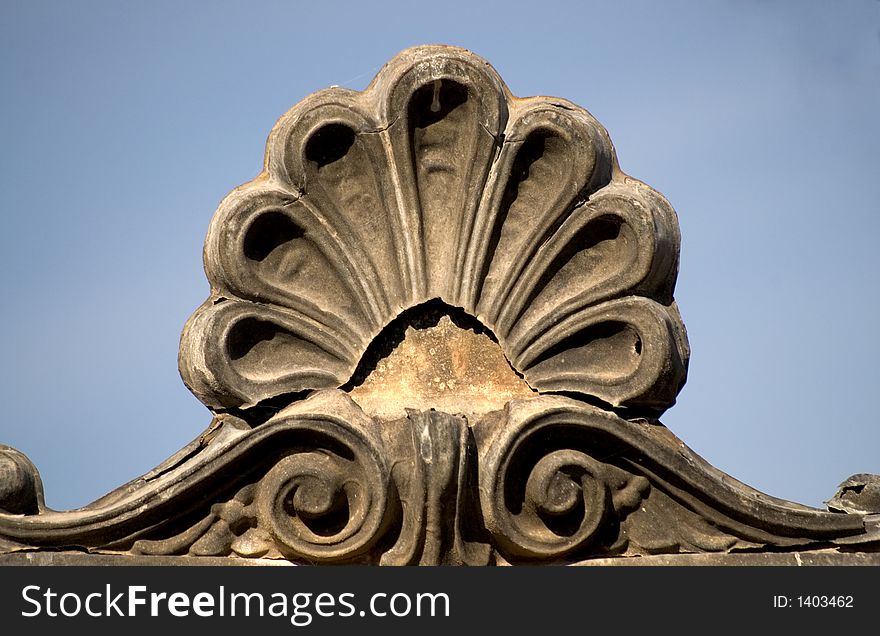 Ornate iron metalwork found in a cemetary. Ornate iron metalwork found in a cemetary