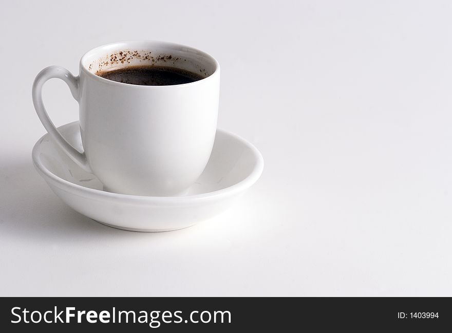 Cup of Coffee on white plate and white background