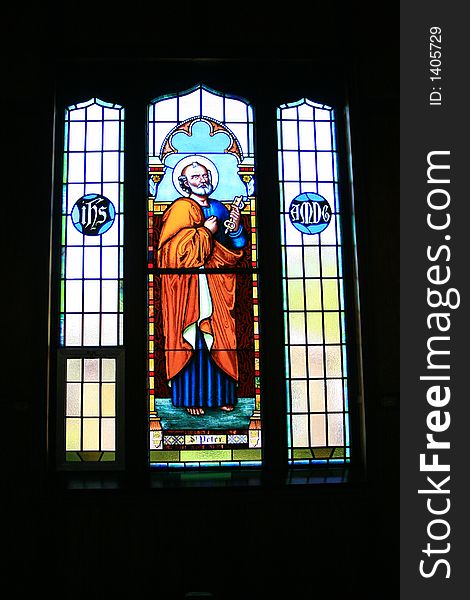 Stained glass window of the Martry's Shrine Catholic Church at Saint-Marie-Among-the-Huron historic site near, Midland, Ontario. Stained glass window of the Martry's Shrine Catholic Church at Saint-Marie-Among-the-Huron historic site near, Midland, Ontario.