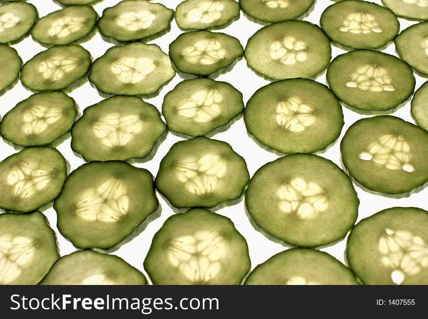 Cucumber sliced pattern on white background