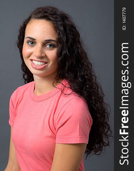 Green-Eyed Woman In Pink Tee Shirt